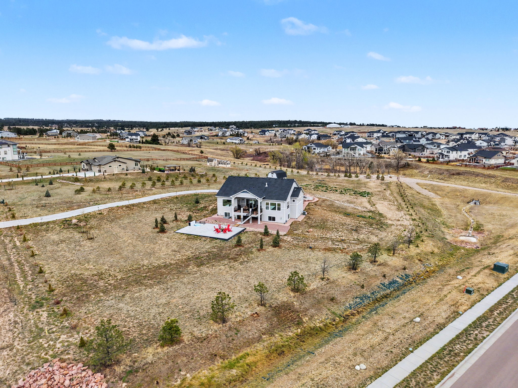 Aerial view of 10003 Aspen Valley Rd Colorado Springs 80908 showing 2.5 acre lot in Black Forest with luxury home and VA assumable loan opportunity
