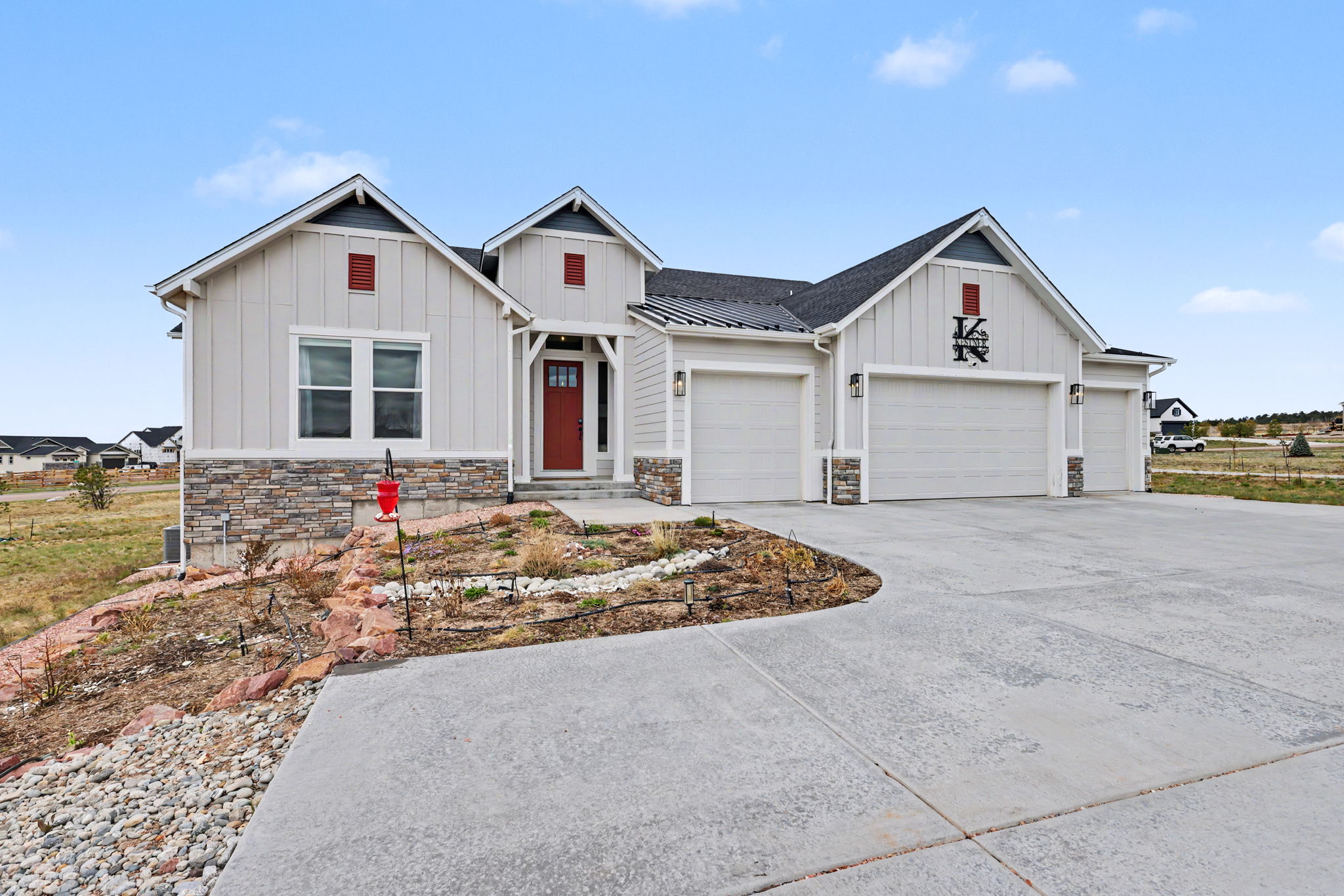Front of 10003 Aspen Valley Rd luxury home in Colorado Springs 80908 with 3.25% VA assumable loan