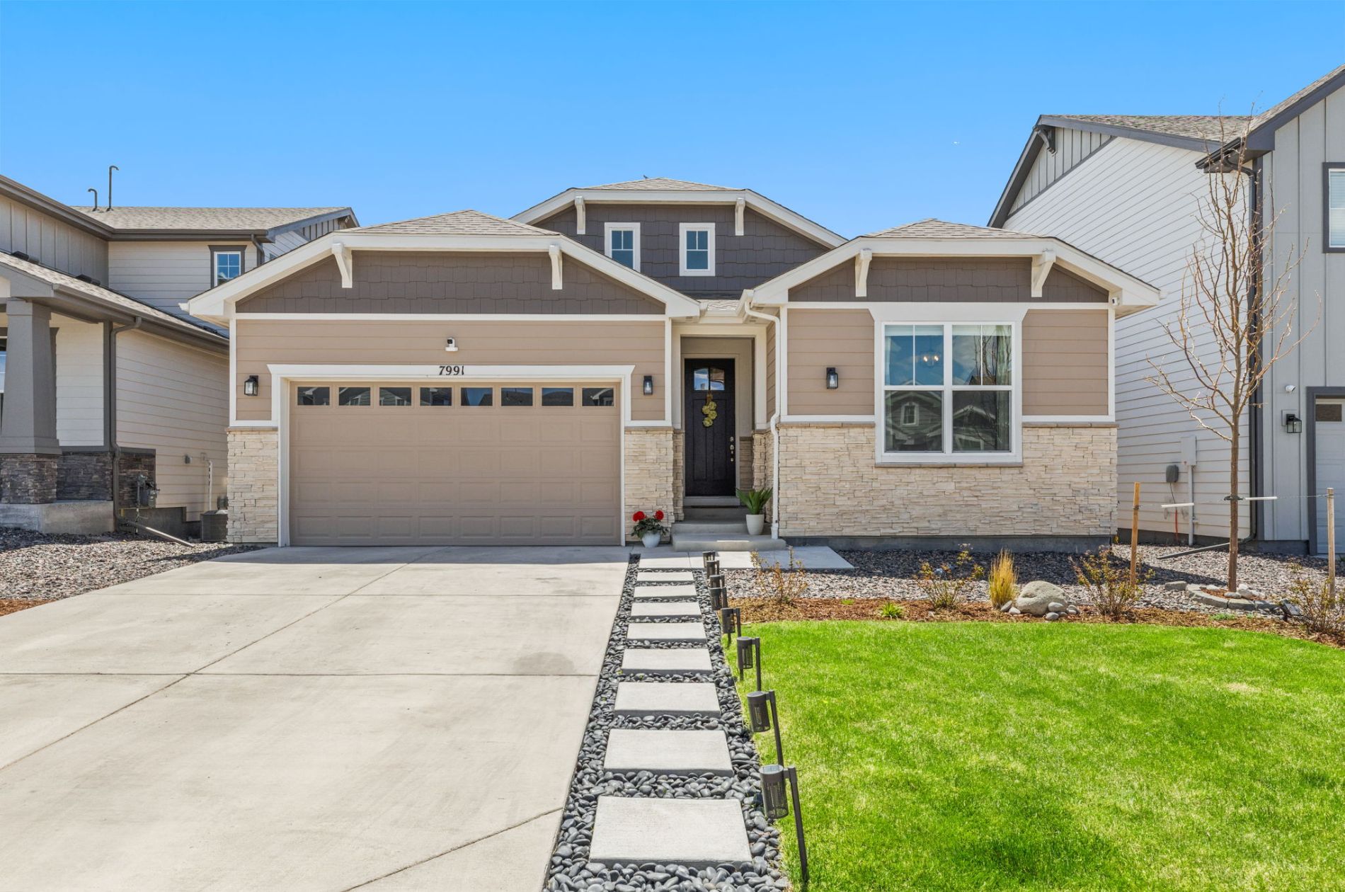 7991 Pennydale Drive, a newer ranch-style home for sale in Sterling Ranch in northeast Colorado Springs